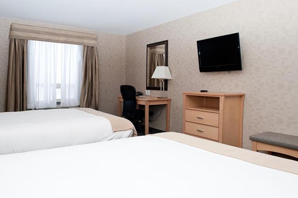 Paradise Inn And Suites Valleyview Habitación foto