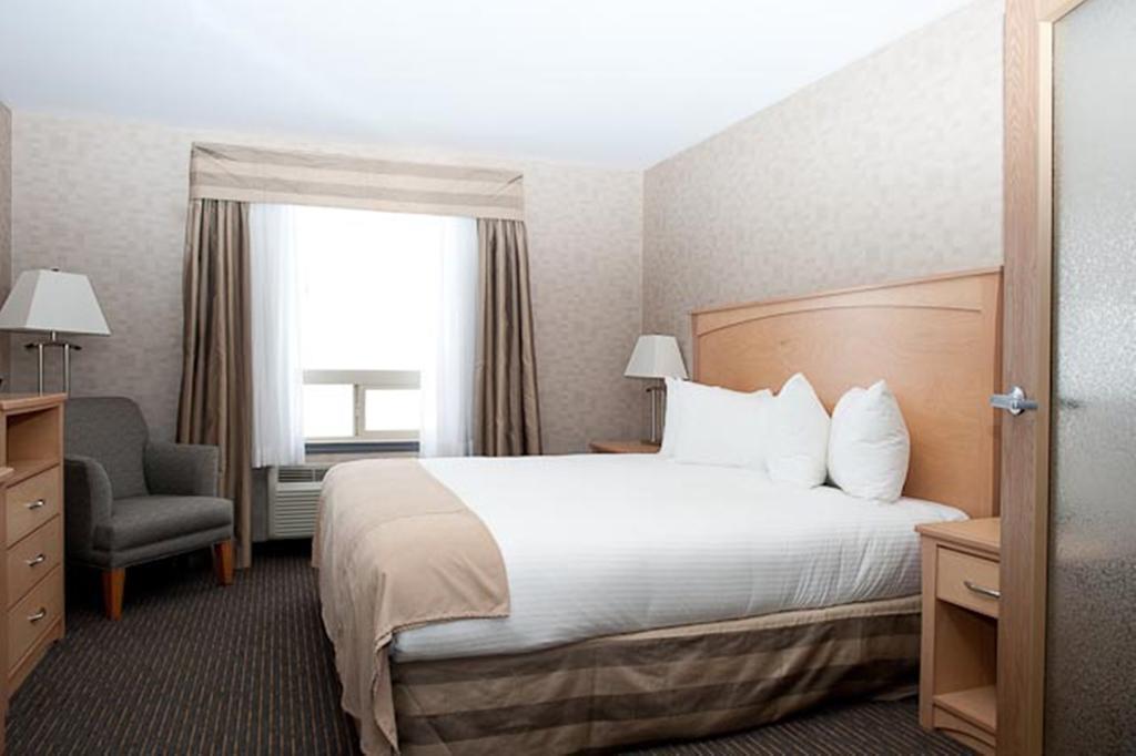 Paradise Inn And Suites Valleyview Habitación foto