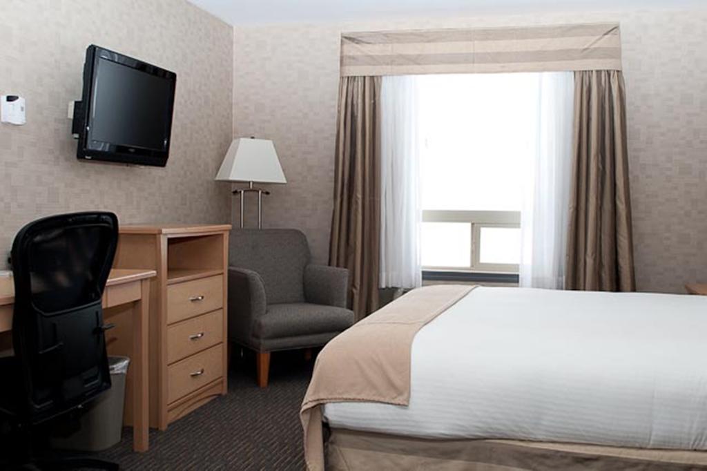 Paradise Inn And Suites Valleyview Habitación foto